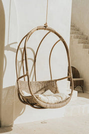 Koboo double handmade durable brown rattan hanging chair for indoor living rooms, covered terraces, patios, balconies, and outdoor gardens