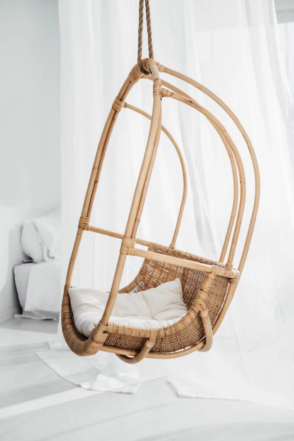 Koboo double handmade durable natural rattan hanging chair for indoor living rooms, covered terraces, patios, balconies, and outdoor gardens