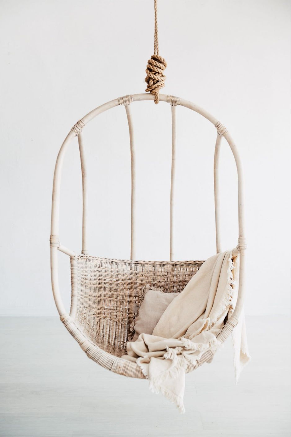 Koboo double handmade durable white rattan hanging chair for indoor living rooms, covered terraces, patios, balconies, and outdoor gardens