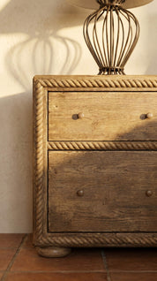 Wooden dresser with rope detailing 