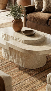 round stone coffee table with minimalist design
