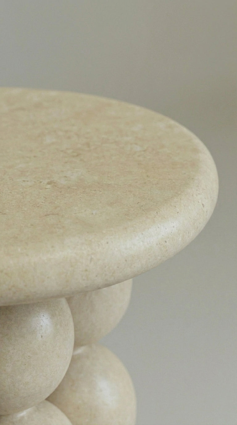 Close-up of a stone stool table