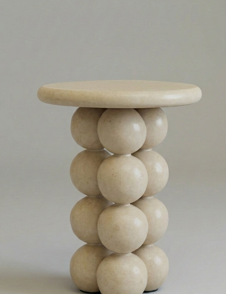 table with spherical design on a plain background