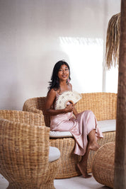 Contemporary rattan sofa with woven texture
