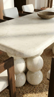 marble dining table centerpiece in contemporary dining room
