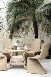 Oriana Collection handmade rattan chair with modern curved design, unique craftsmanship