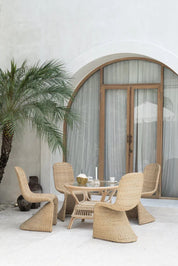 Oriana Collection handmade rattan chair with modern curved design, unique craftsmanship