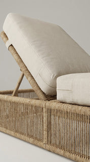 Wicker chair with beige cushion 