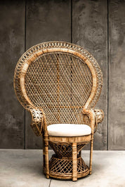 Peacock rattan chair with high back and cream cushion, handcrafted from natural rattan, perfect oversized boho accent for indoor or covered outdoor spaces