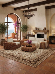Handmade rattan chair with curved armrests

