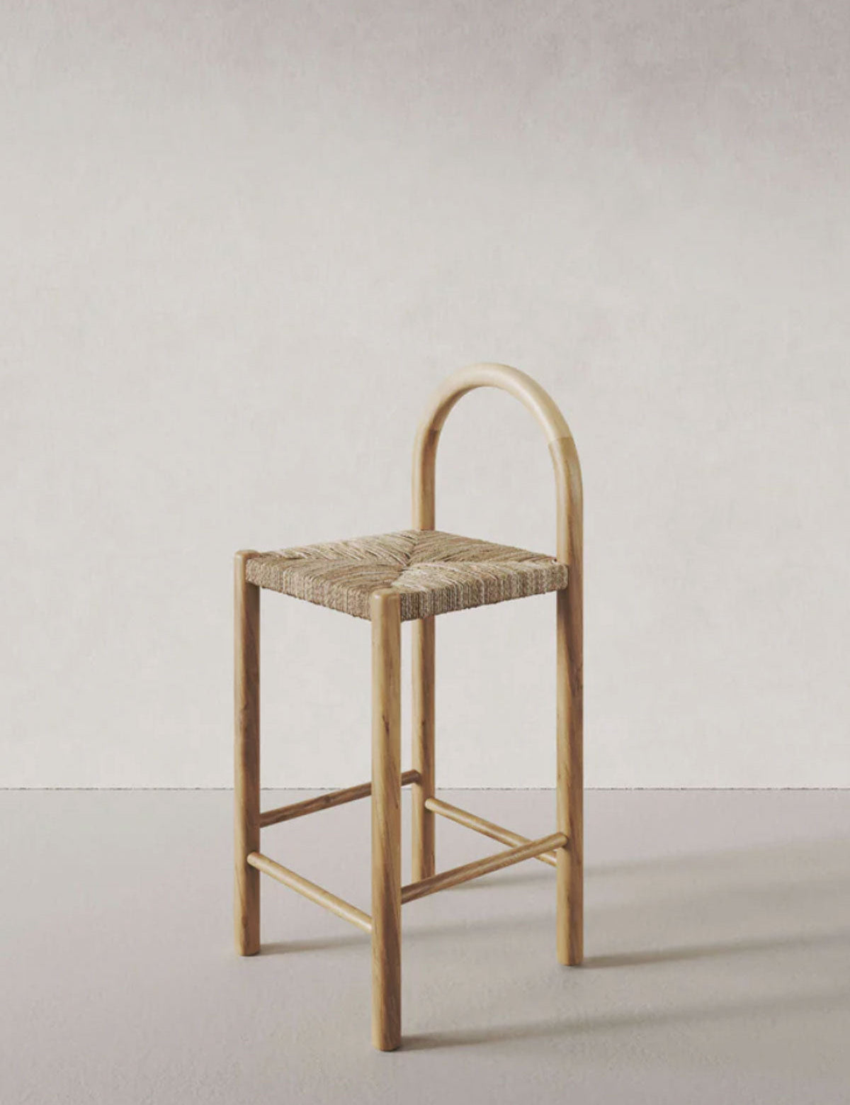 Wooden bar stool with woven seat 