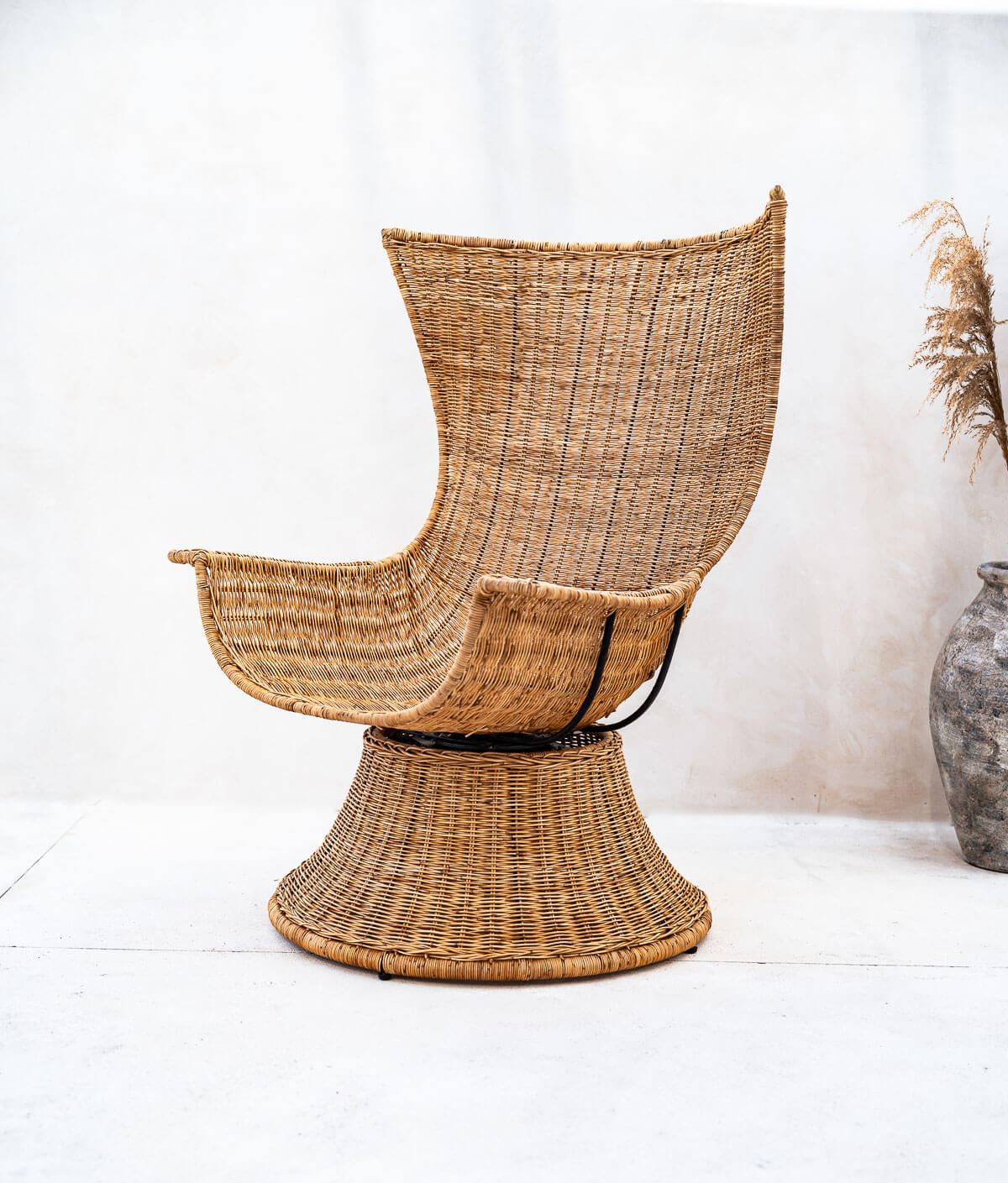 Natural rattan chair placed in modern interior
