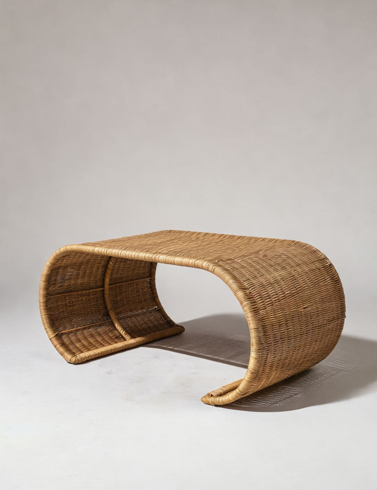 Sculptural rattan coffee table for modern living room
