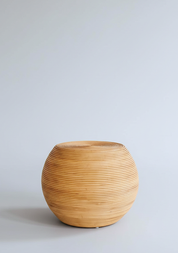 Natural woven rattan accent table for modern interiors
