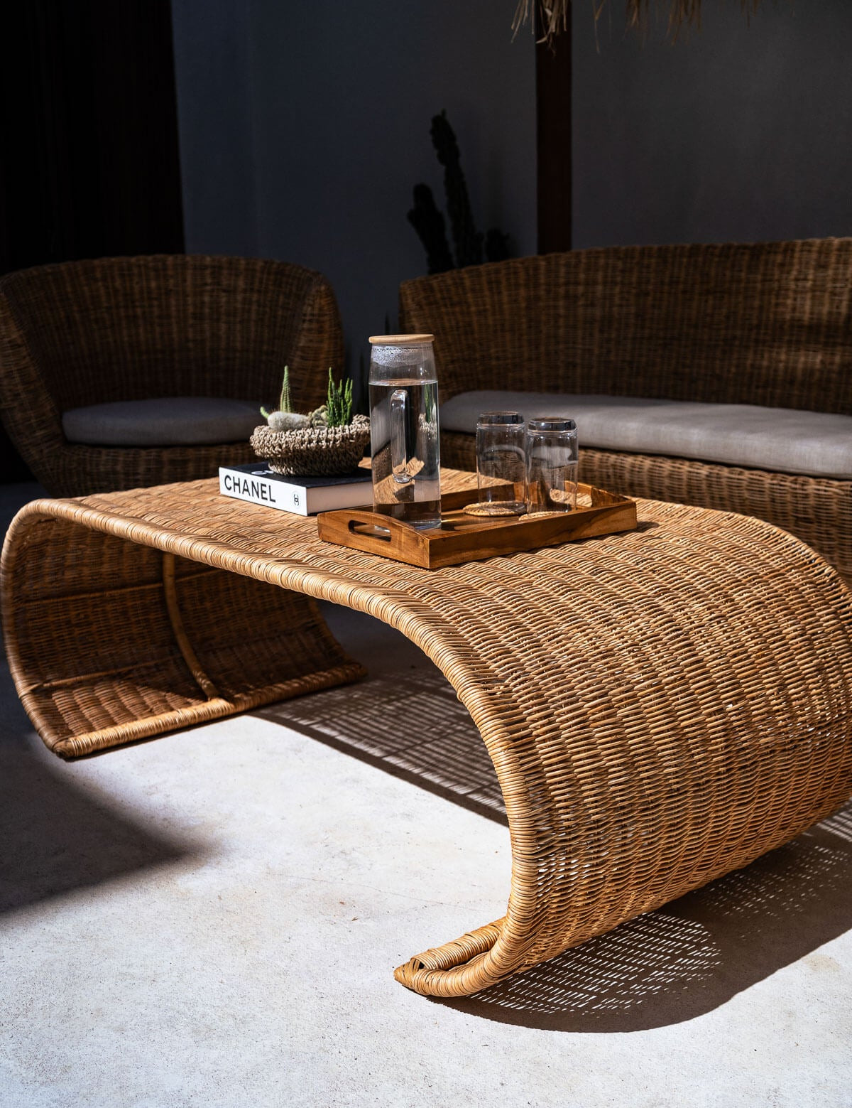 Natural rattan coffee table in coastal style interior
