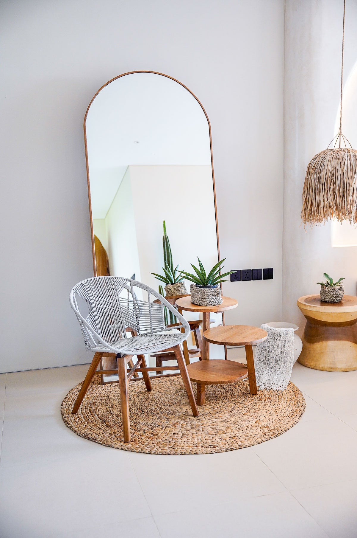 Teak wood dining chair in neutral modern home
