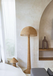 Woven floor lamp in a room with neutral decor