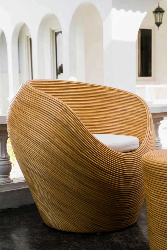 Handmade rattan armchair natural with boho style, perfect for cozy living spaces