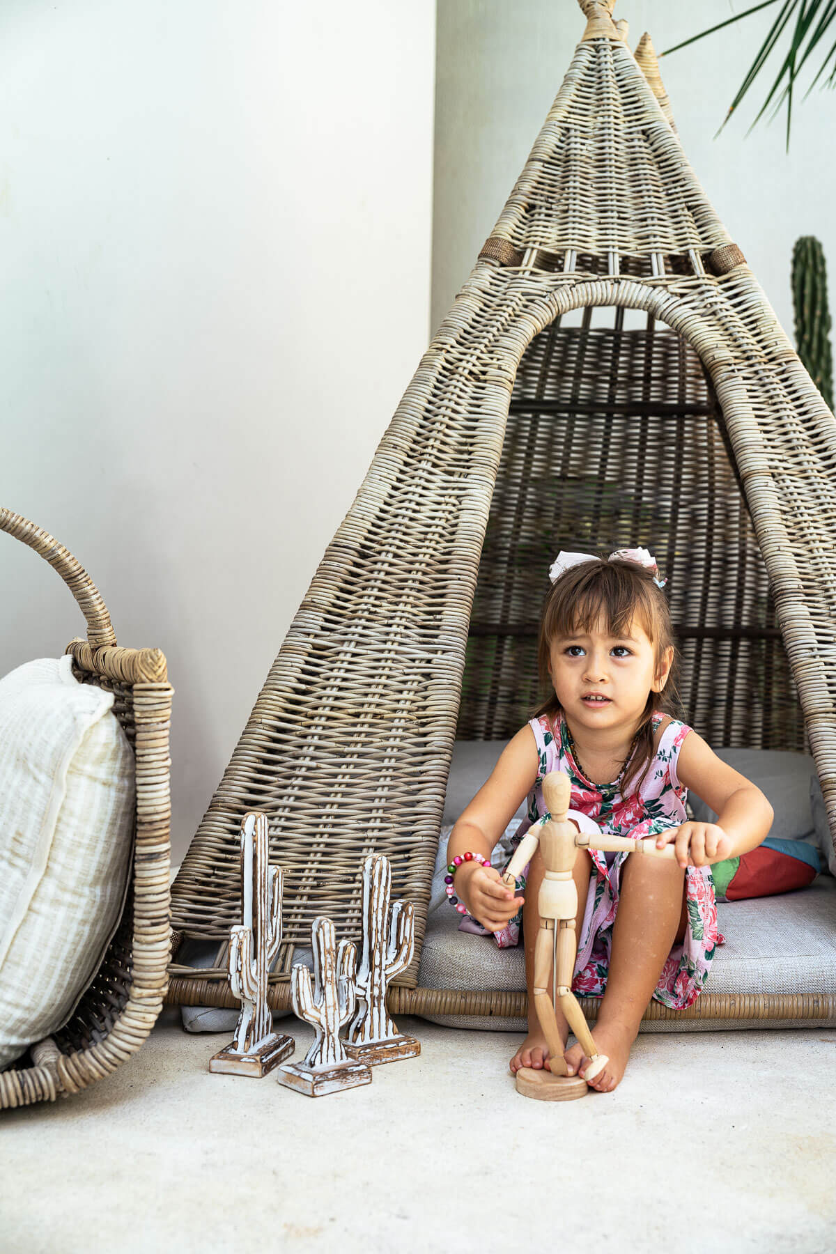Rattan lounge tent styled in coastal interior
