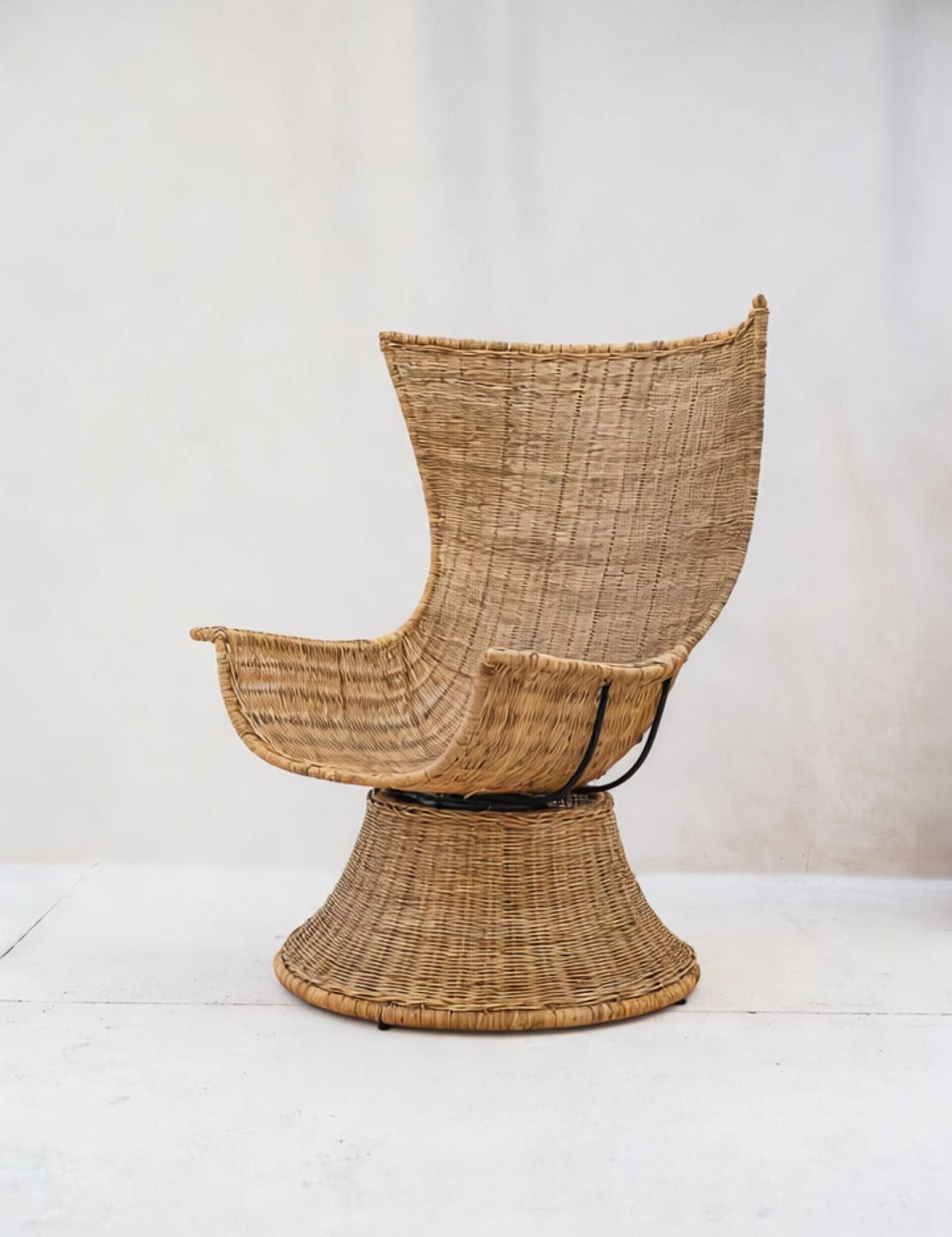 Wicker chair with a modern design on a white background