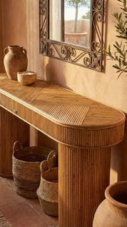 Woven rattan side table in living room setting
