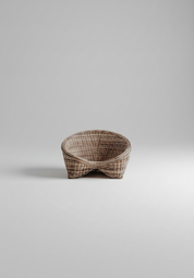 Woven basket on a light gray background