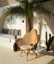 Modern rattan dining chair with natural tones
