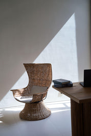 Organic curved rattan lounge chair
