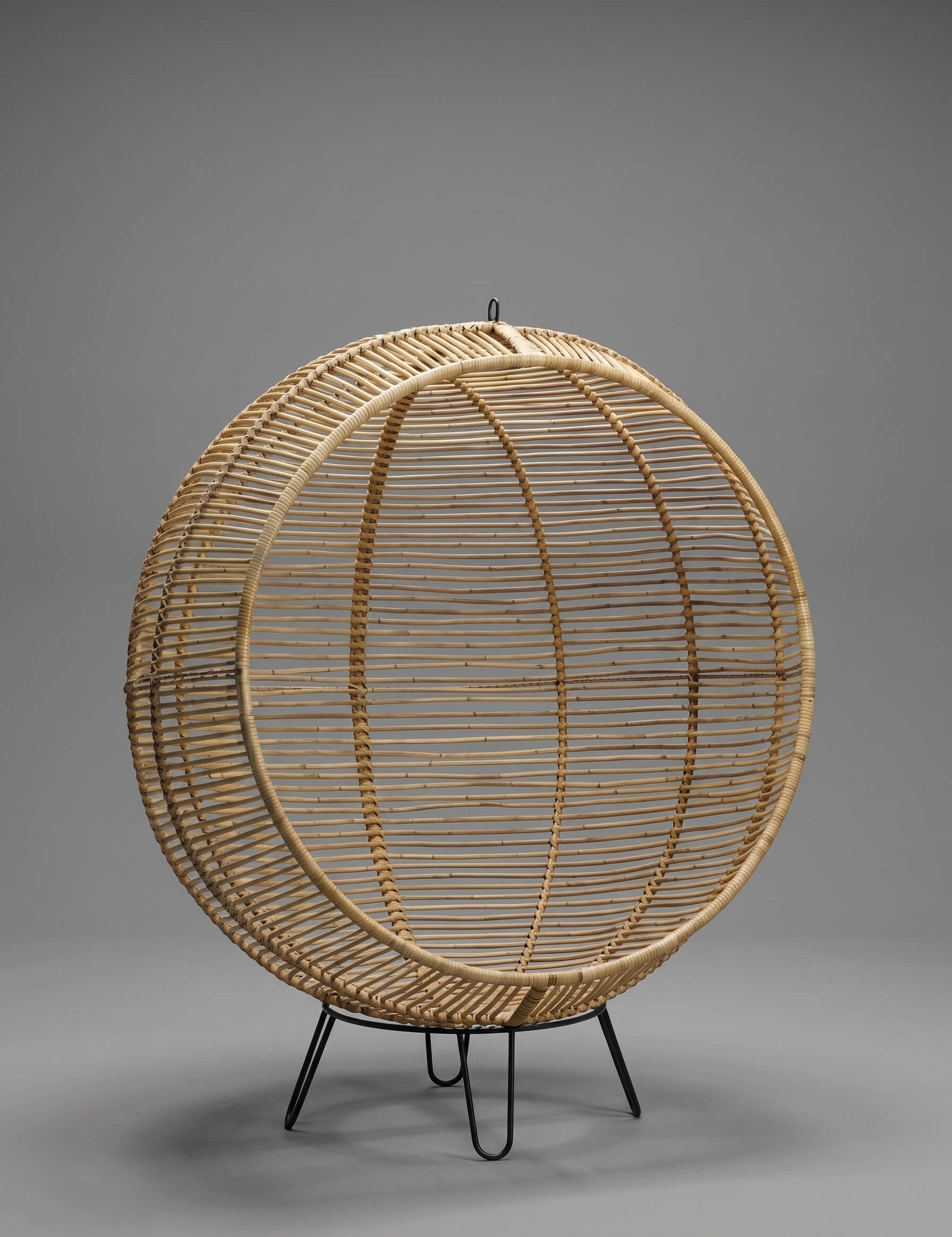 Rattanround chair styled beside lounge chair
Handcrafted rattan chair with woven texture