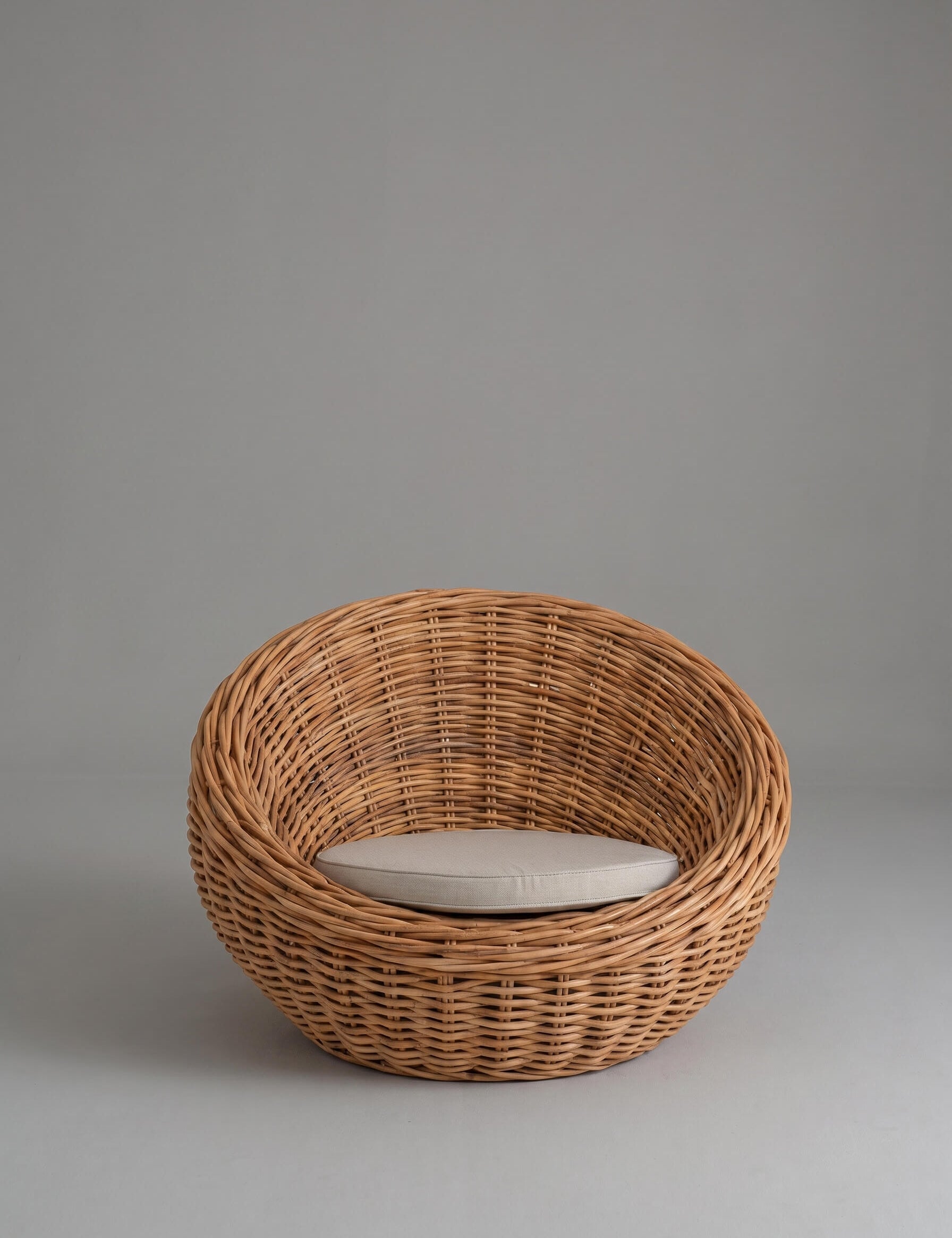 Rattan lounge chair styled in coastal interior
Curved rattan