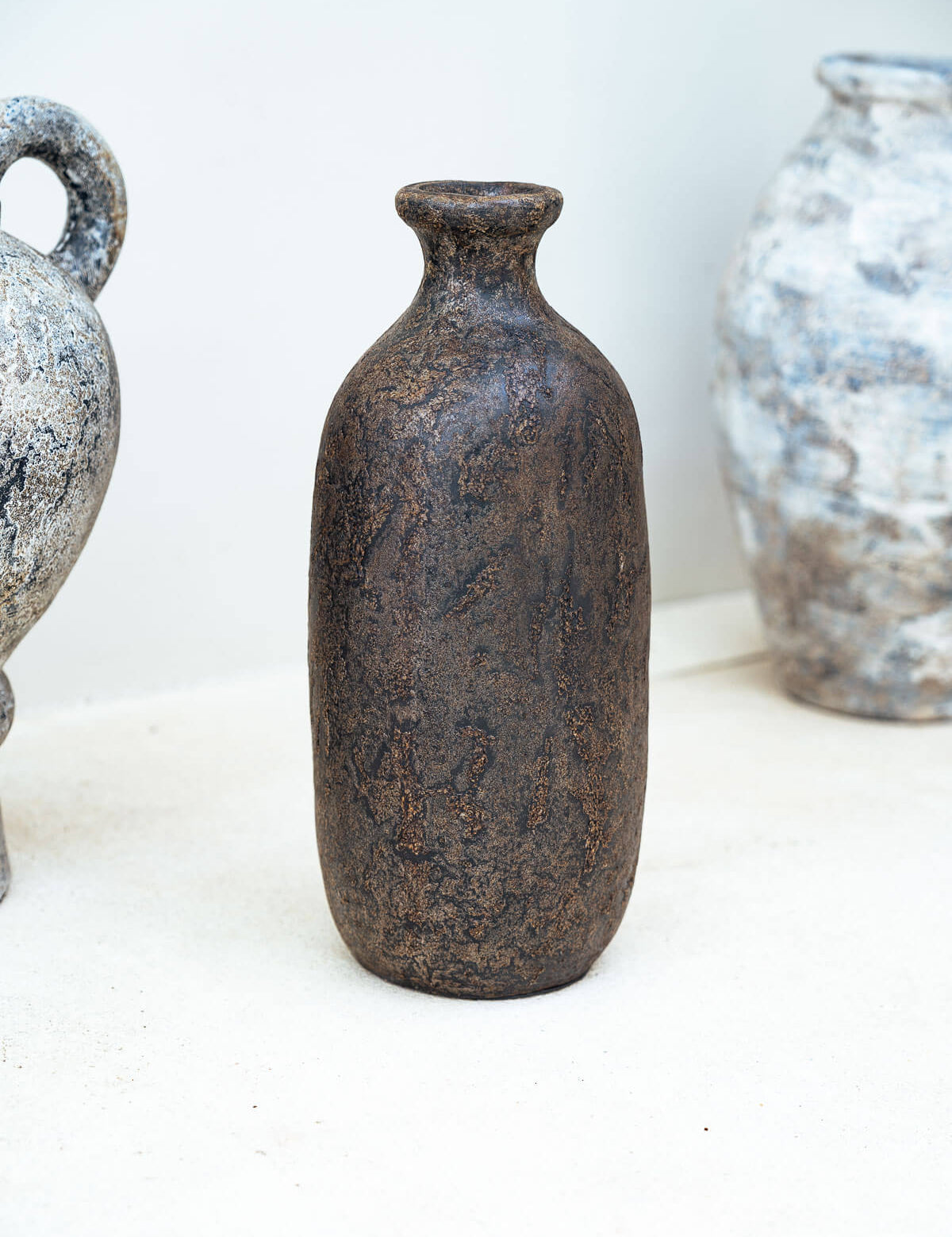 Decorative ceramic vases on a white surface