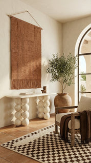 marble console table center piece in contemporary living room
