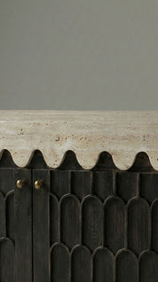 Dark wooden cabinet with decorative scalloped edge 