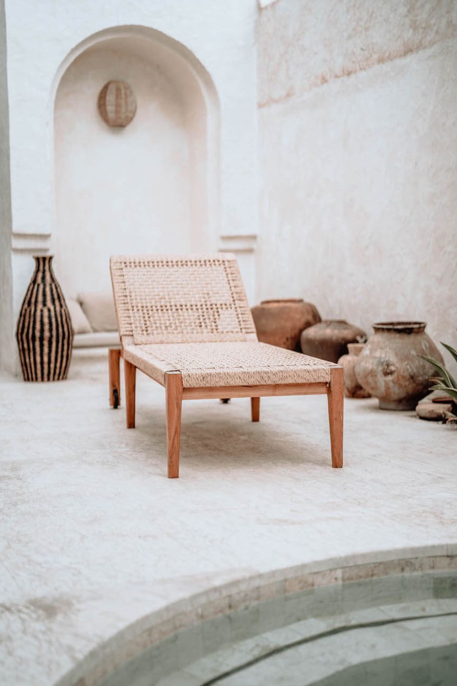 Lunan teak wood sun lounger with adjustable backrest and convenient wheels for outdoor relaxation