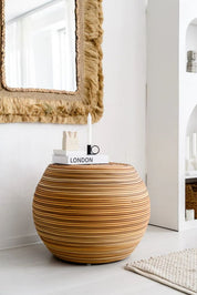 Multifunctional synthetic round rattan table for use as a coffee table, side table, or decorative piece