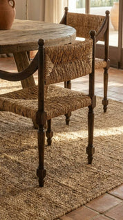 Minimalist teak wood dining chair with solid construction
