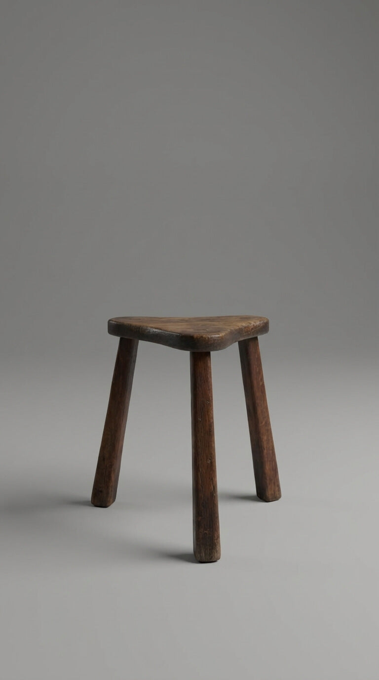 Wooden stool on a gray background