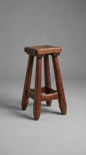 Modern teak wood chair in coastal-inspired room
