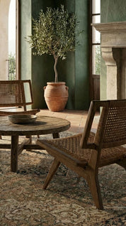 Teak wood lounge chair with organic curves
