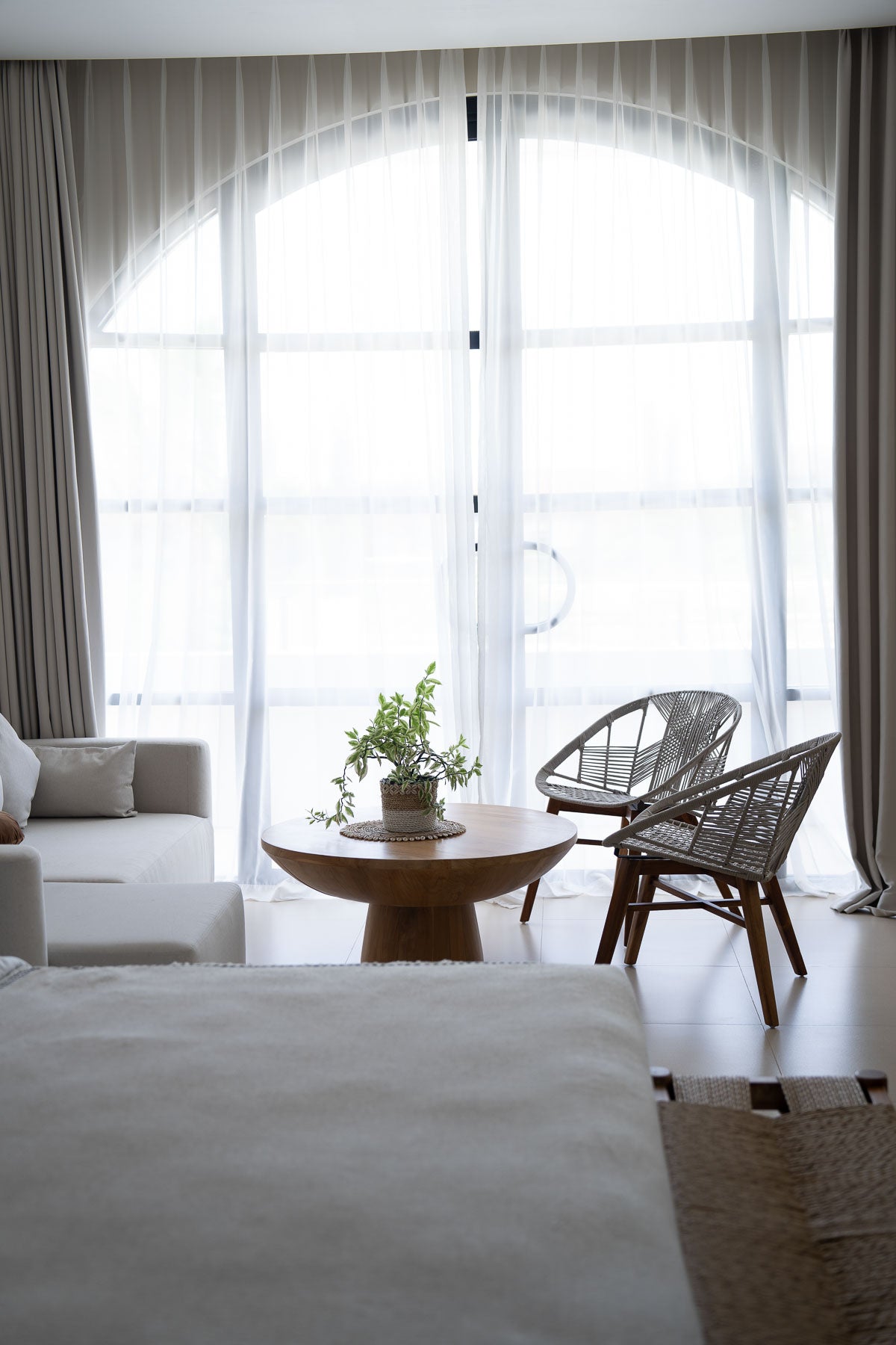 Handcrafted teak wood armchair with rope
