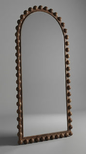 Decorative mirror with a brown, beaded frame 