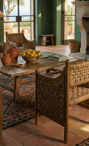 Solid teak wood armchair with natural texture