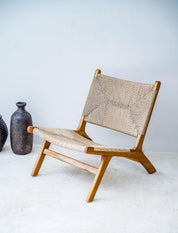 Teak wood dining chair styled in modern home
