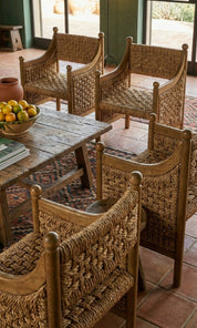 Handcrafted teak wood dining chair with rope
