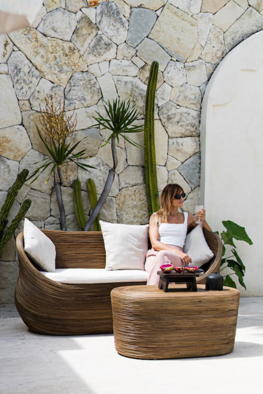 Tegal Oval Rattan Table in rich brown finish, handwoven from durable natural rattan for indoor or outdoor use