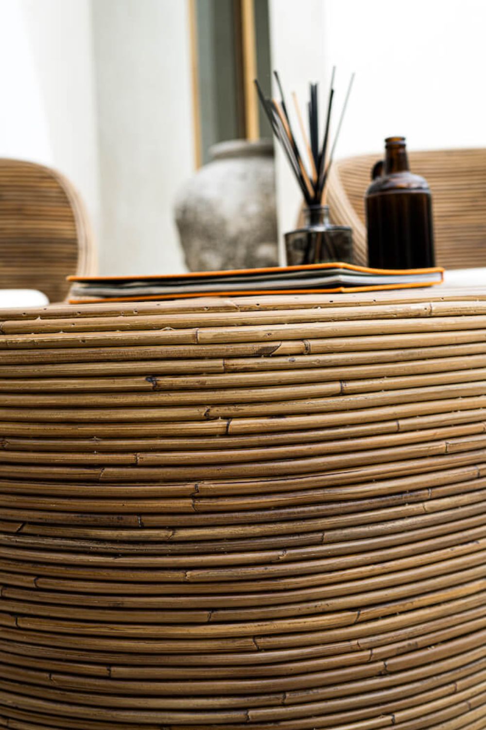 Tegal Oval Rattan Table in rich brown finish, handwoven from durable natural rattan for indoor or outdoor use