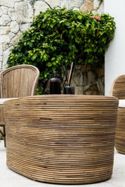 Tegal Oval Rattan Table in rich brown finish, handwoven from durable natural rattan for indoor or outdoor use