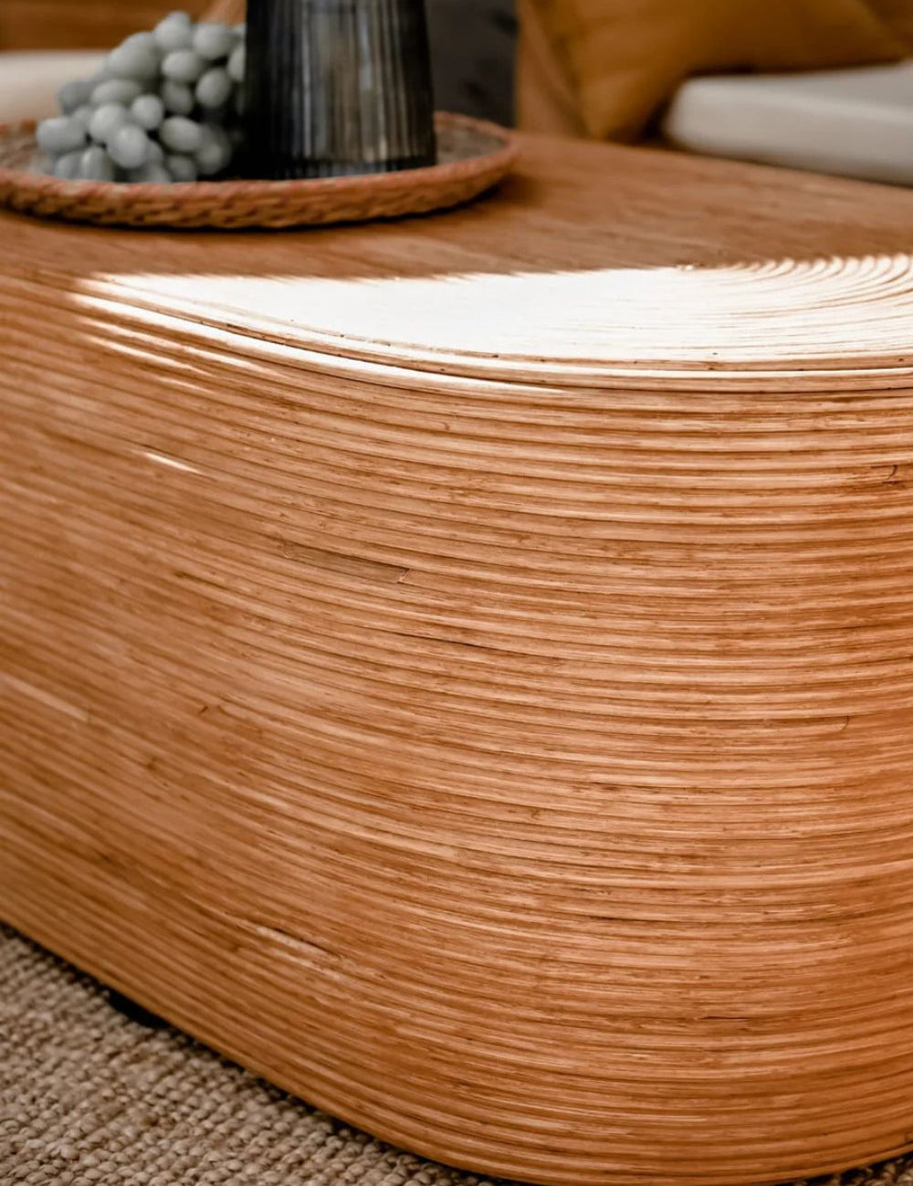 Tegal Oval Rattan Table in rich cognac finish, handwoven from durable natural rattan for indoor or outdoor use