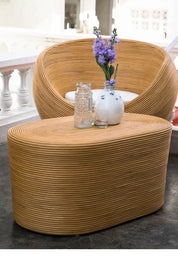 Tegal Oval Rattan Table in rich natural finish, handwoven from durable natural rattan for indoor or outdoor use