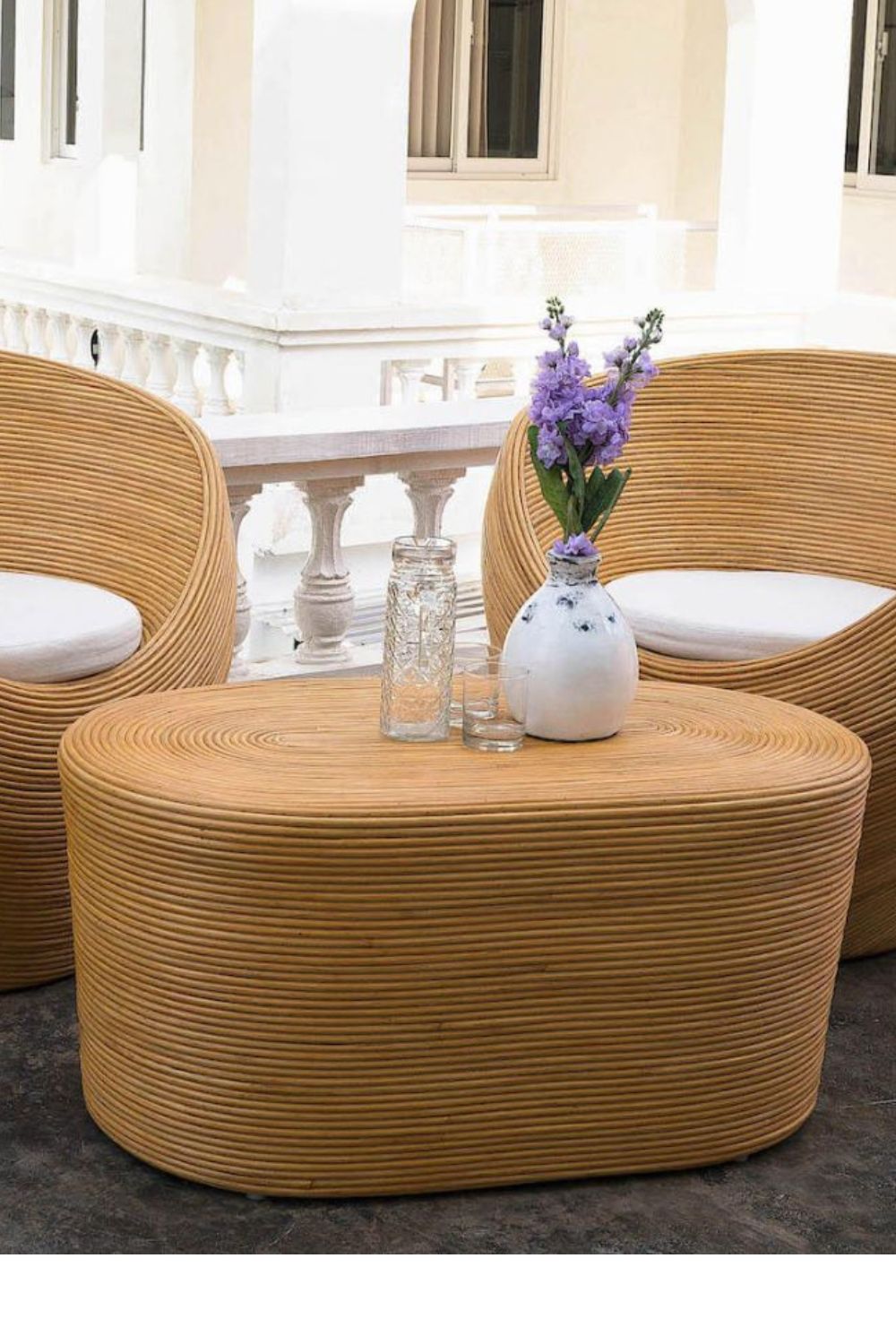 Tegal Oval Rattan Table in rich natural finish, handwoven from durable natural rattan for indoor or outdoor use